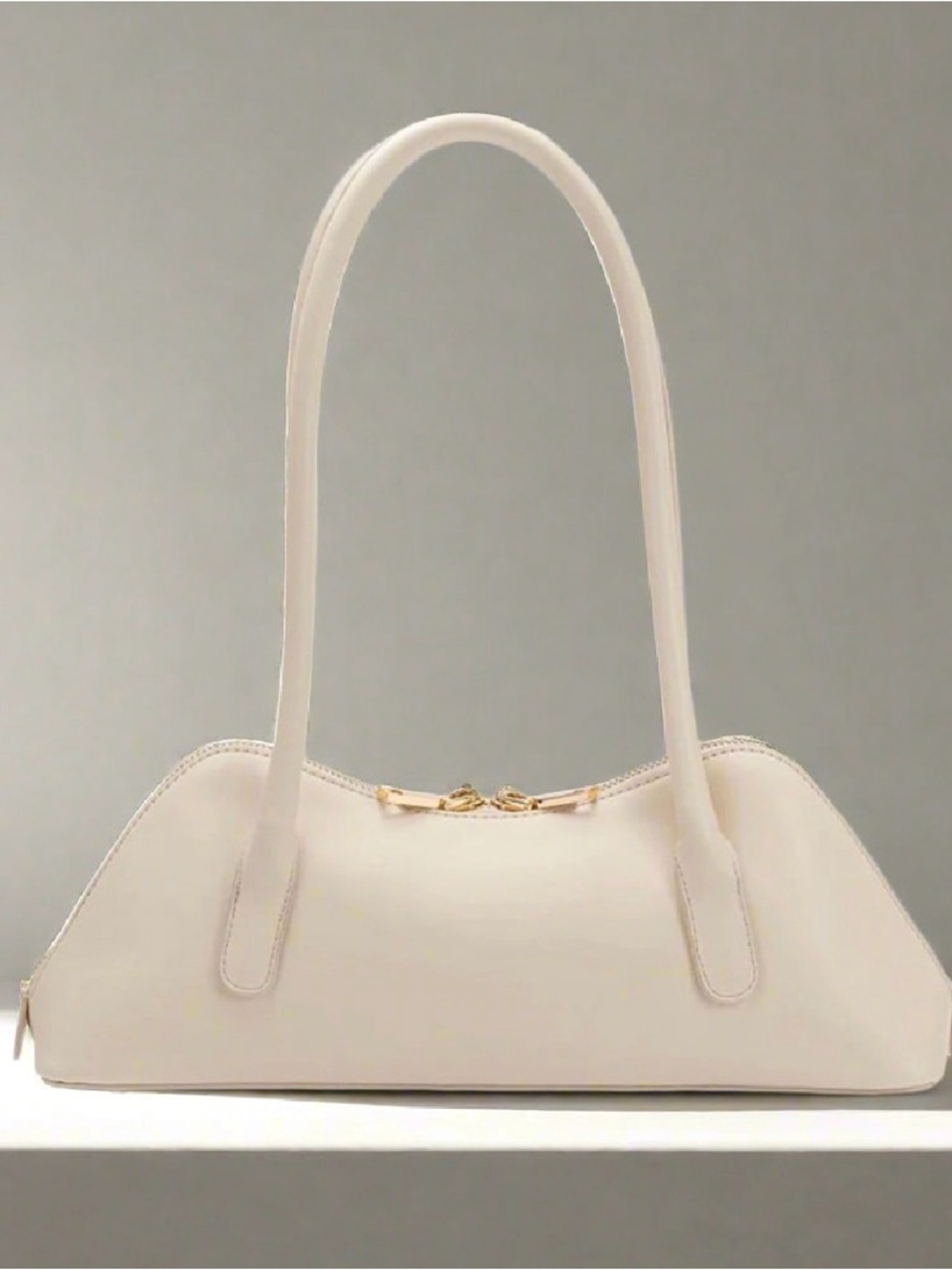 Elegant Cream Shoulder Bag with Gold Hardware